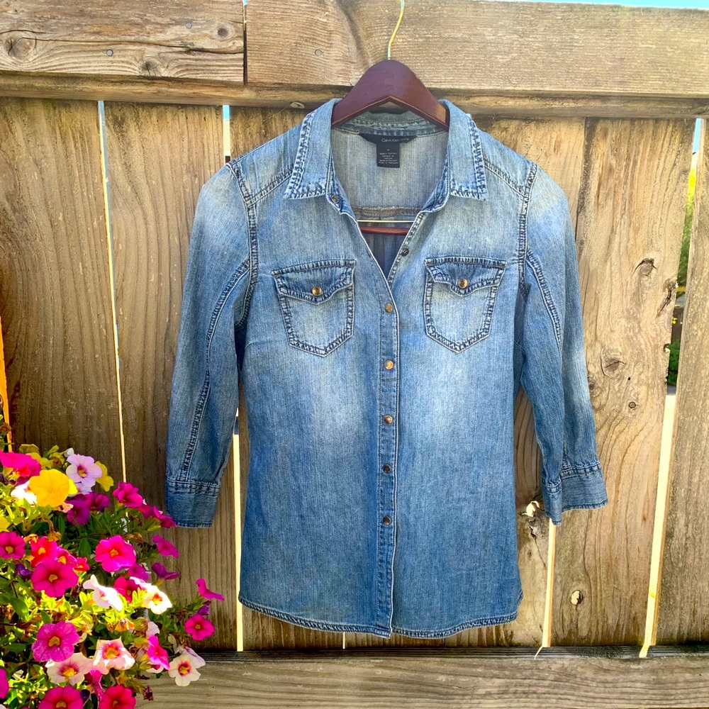 Calvin Klein antique-washed denim button-up in lightweight denim.